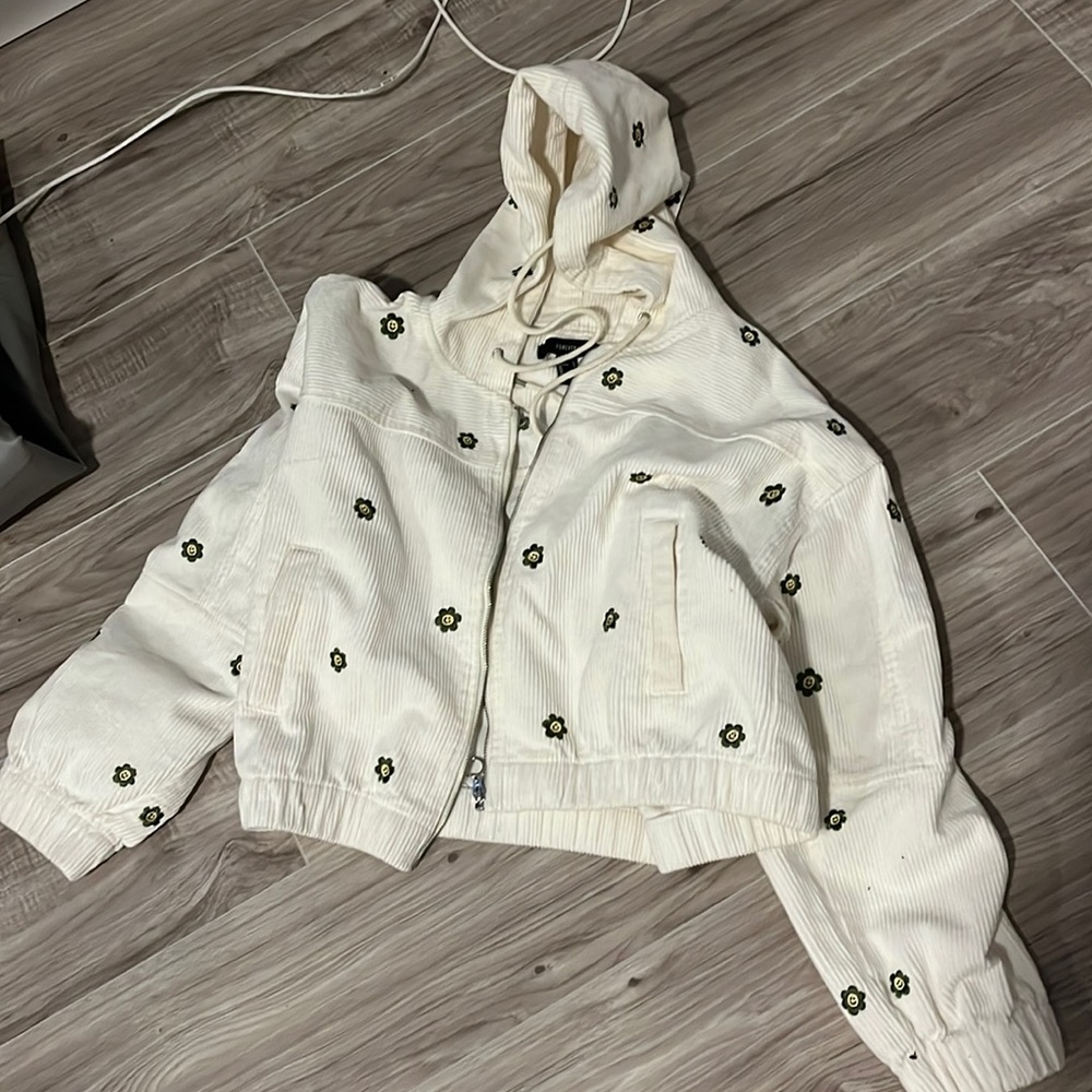 White jacket with embroidered flowers